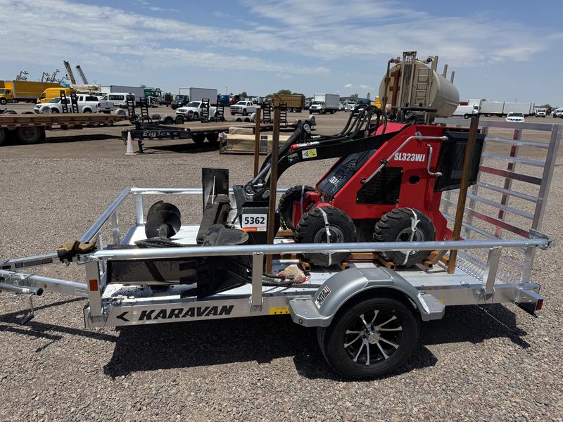 Mini skid steer and attachments from an auction