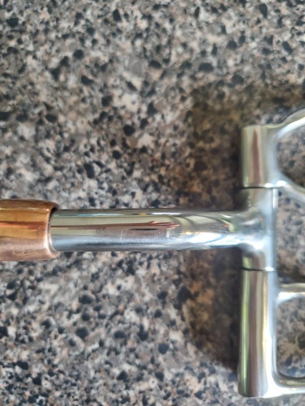 Missing flush brass fittings in cheek pieces and mouth and no inlaid copper mouth to either side of roller.