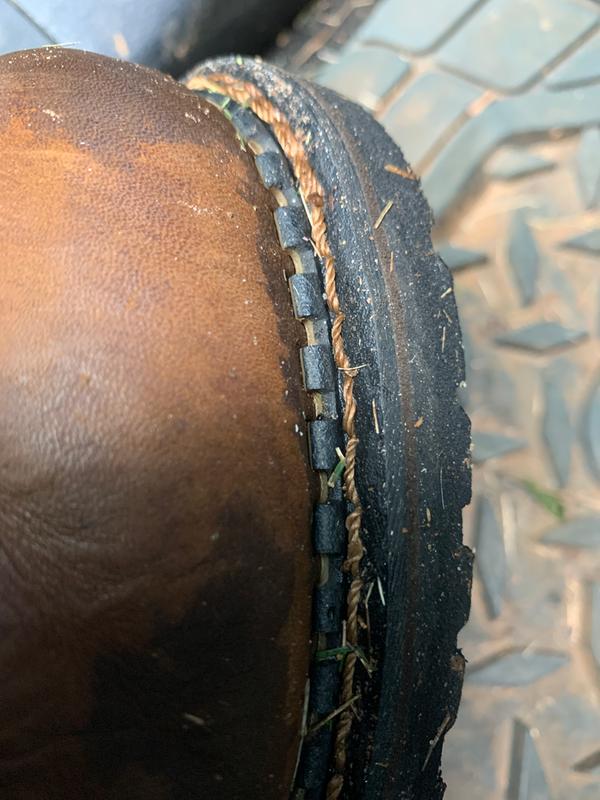 When the soles are stitched on like these, a shoe repair place can replace them to extend the life of your boots.