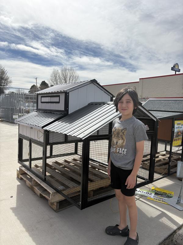 Shawn with the new chicken coop!