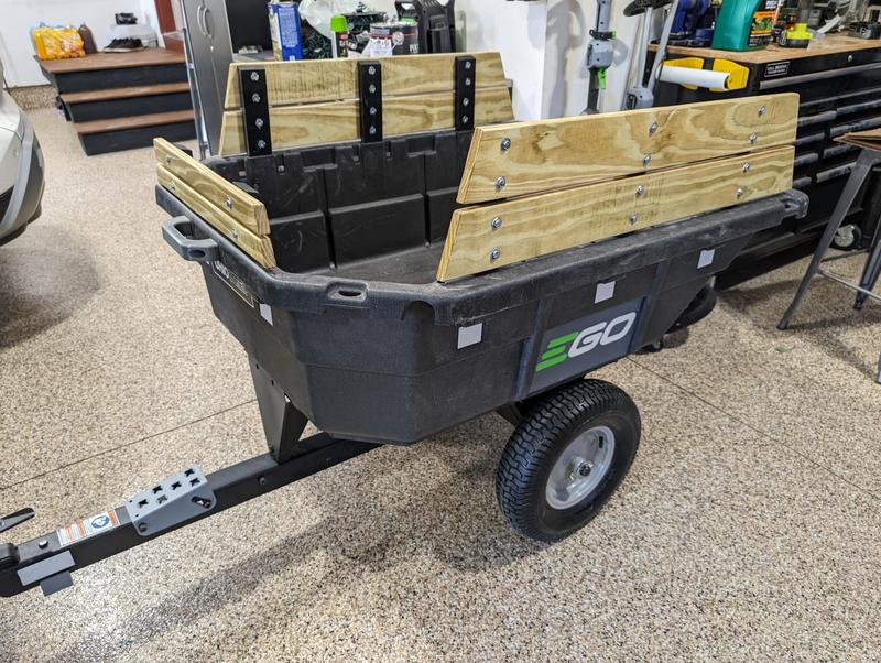 Trailer with home built fence and custom branding to match my mower. (mostly vanity at work here)