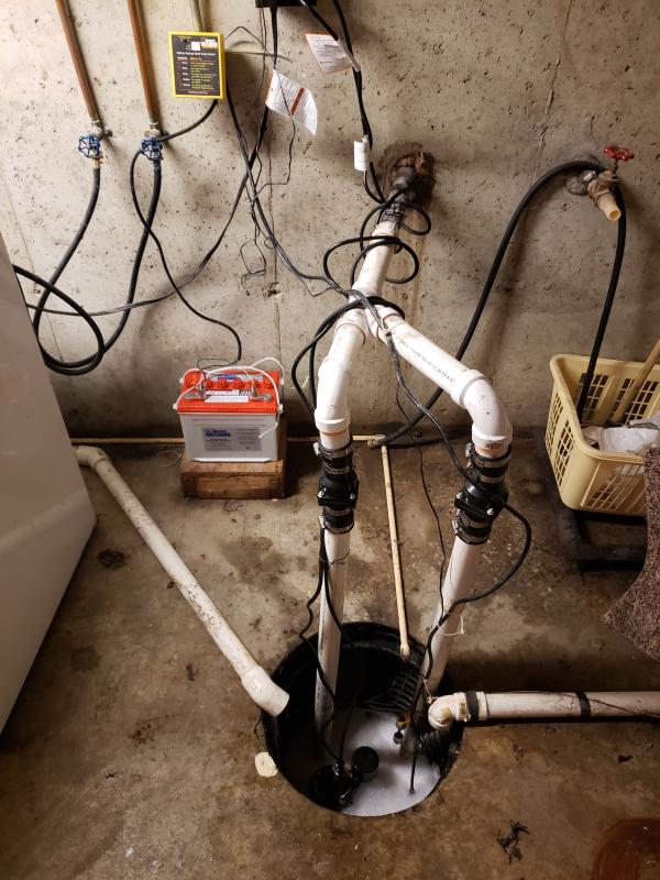 New one installed w/backup battery sump pump