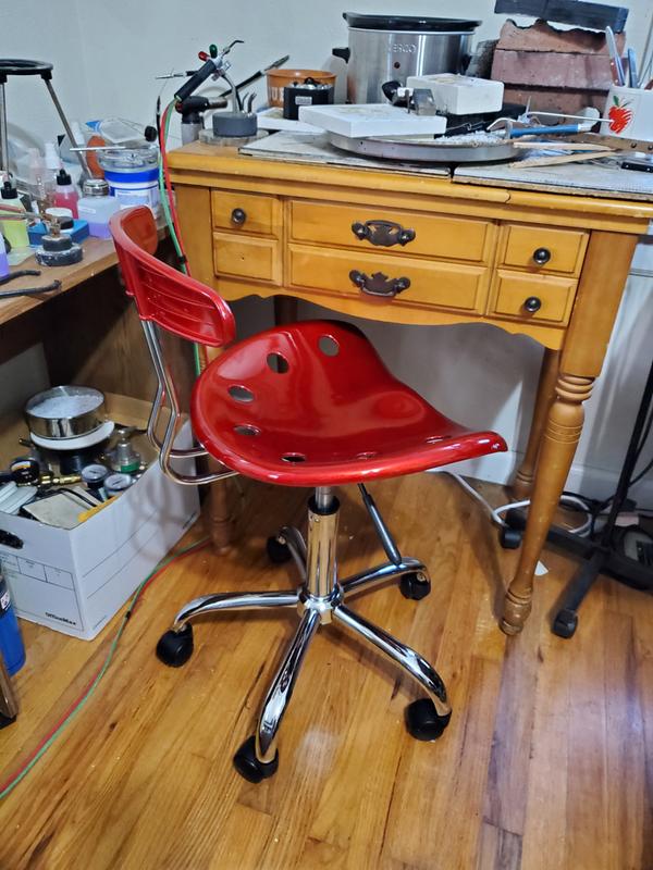 Chair at my soldering station.  Just what I needed and it's pretty!  (Keep in mind, the back rest and the seat are heavy plastic......thus, the great price).