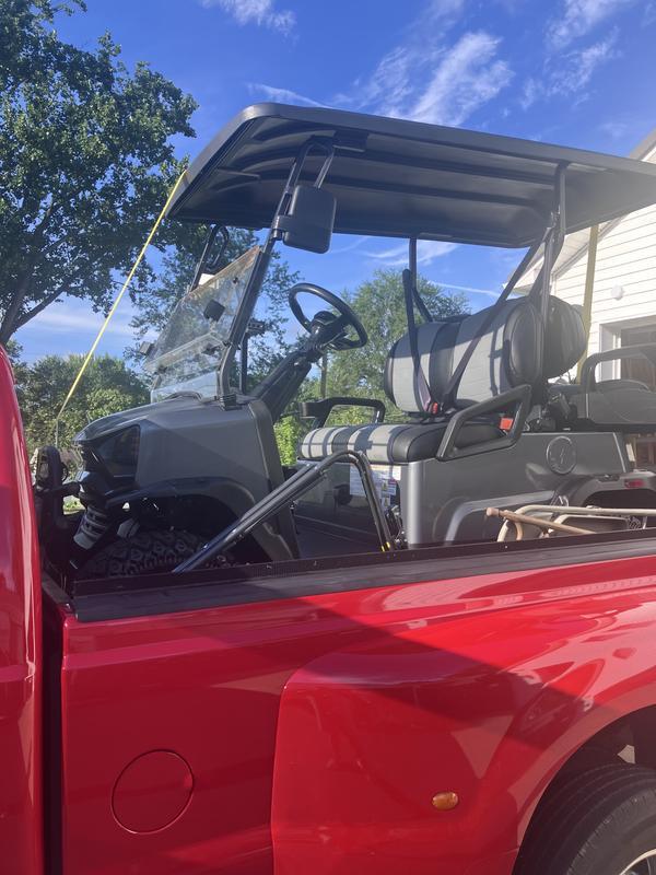 Racka golf cart-just fits in the back of my dualy (after removing the back step.) perfect for traveling.