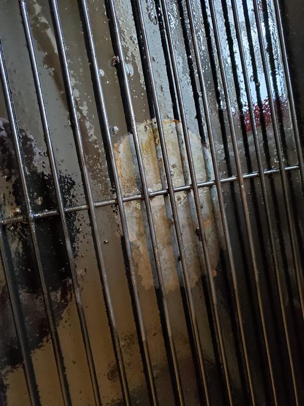 Grill pan (top) showing finisb burned off (currently heavily coated in vegetable oil to slow or hopefully stop rusting)