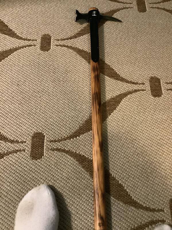 I flame hardened, hand rubbed boiled linseed and final wrapped handle in 550 paracord rope.