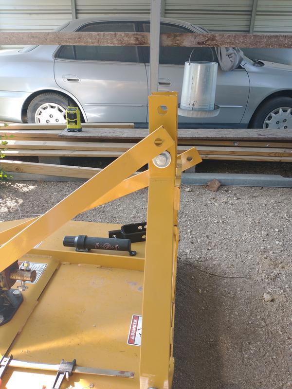 The bars connect the A frame at silver bolts, will not flex with up and down motion of the mower. Top hole is for Top Pin from tractor.