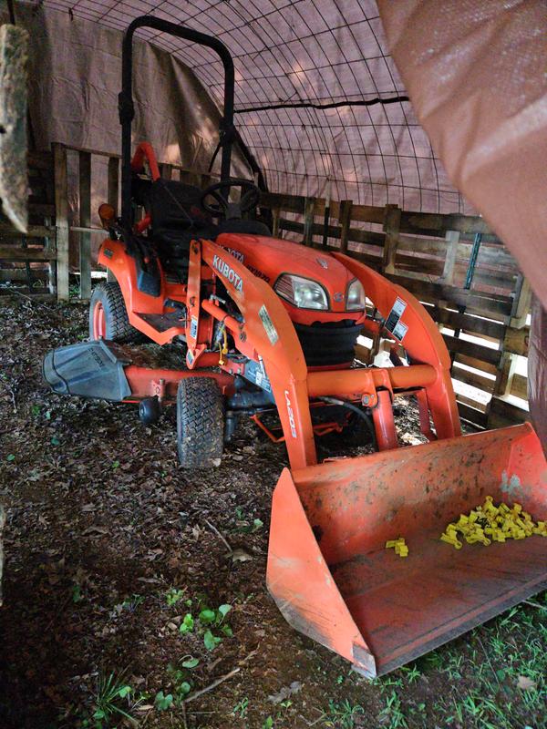 Tractor under tarp