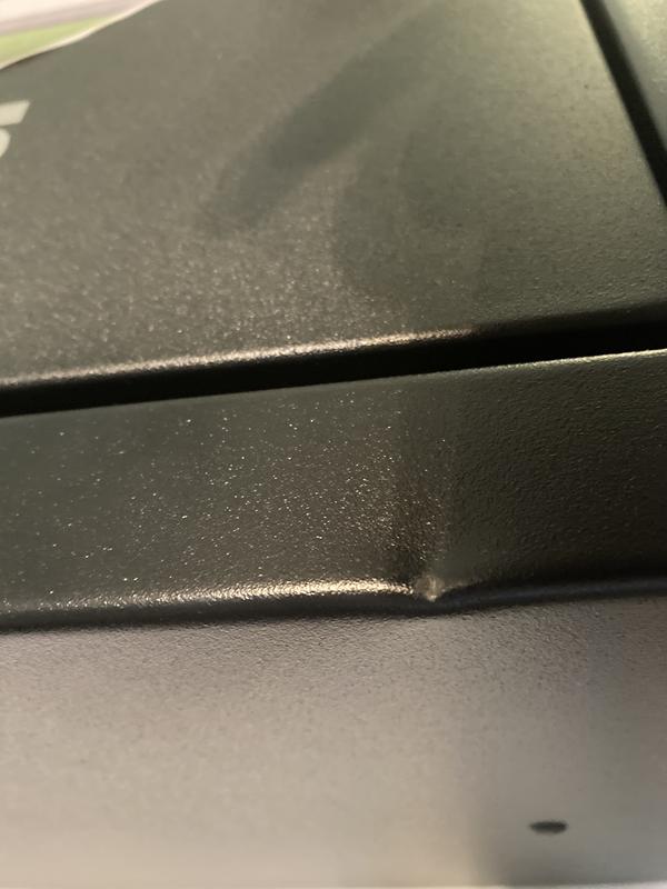 Small dent on top edge