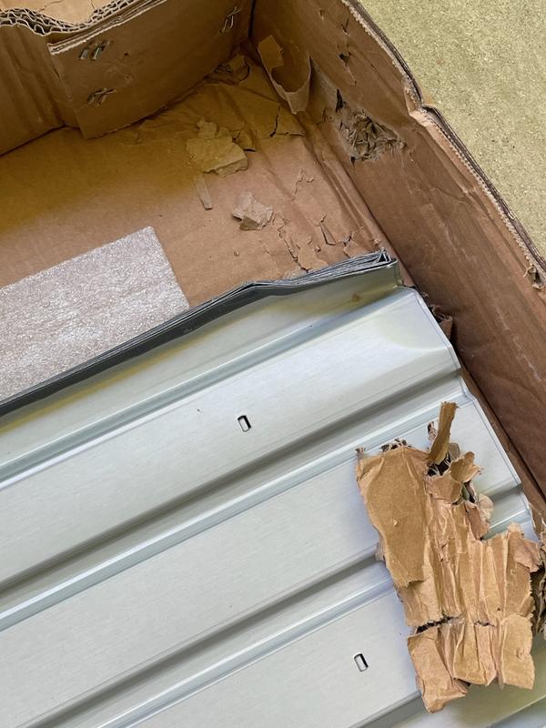 All of the panels bent in the corner, from box being dropped and/or not handled properly.....WITH CARE!  Thanks a lot FedEx.