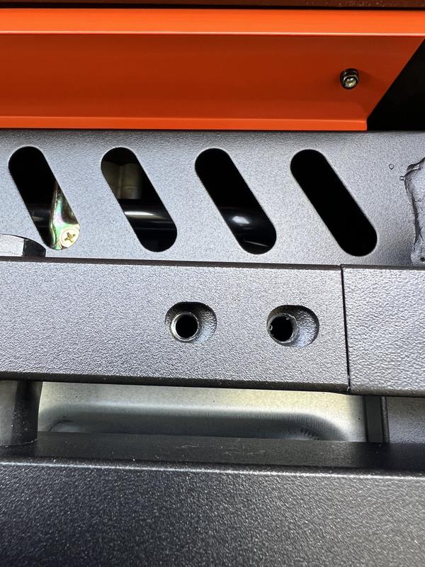 A total of six misaligned holes. Where is the quality control?
