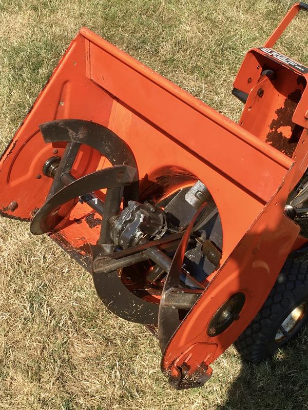 Snow blower worm gear drive auger.