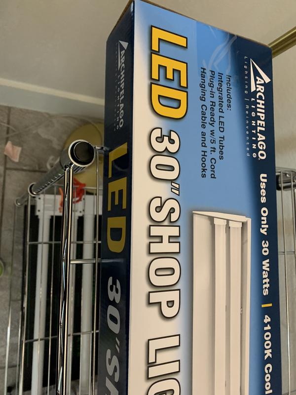 30” shop light sticking off either side of my 24” (aka 2-ft.) shelf