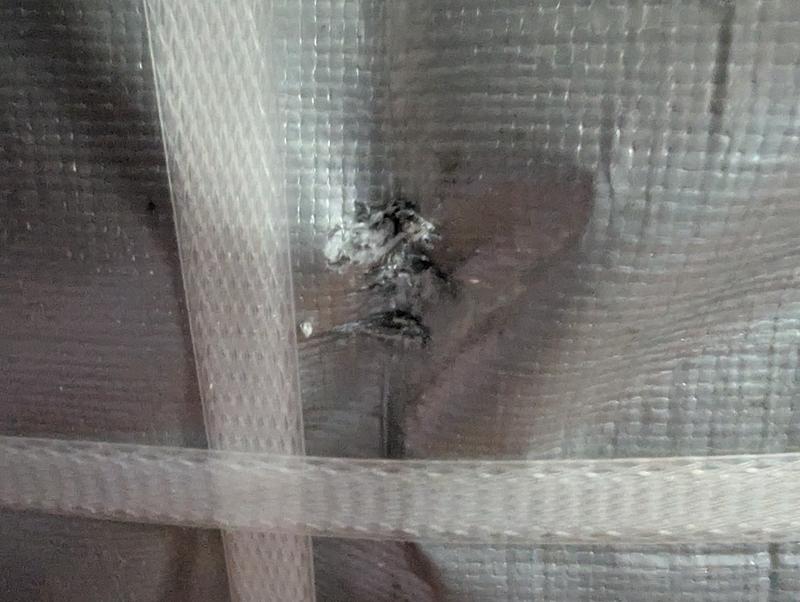 Hole which was hidden behind a shipping sticker