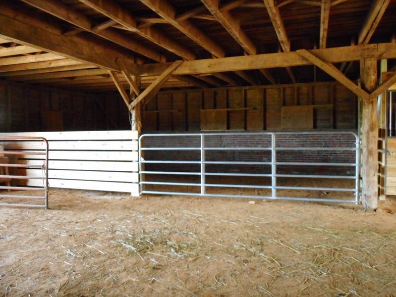 My new hay storage area with my Tractor Supply 14' gate