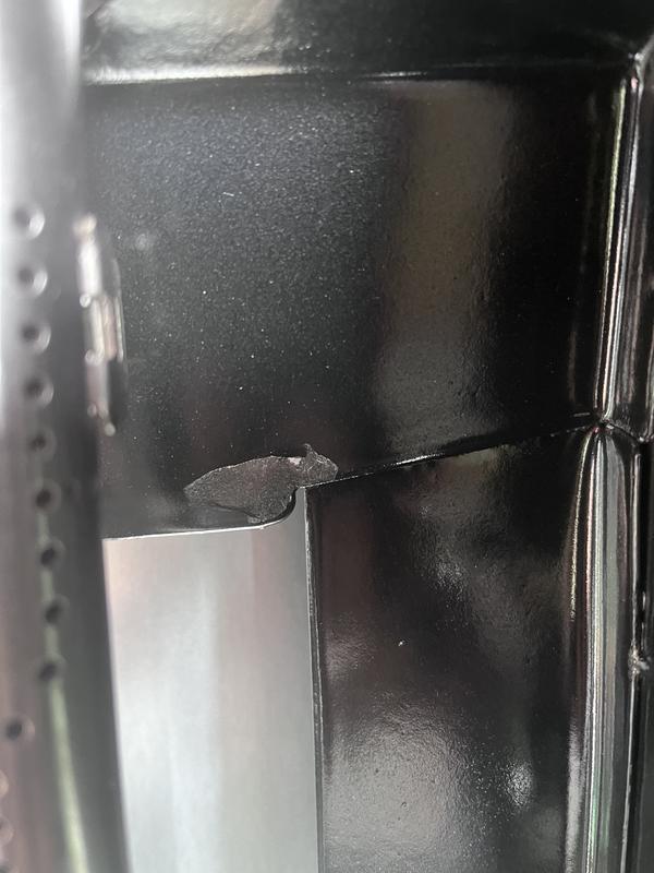 Missing paint, exposed metal, rust.