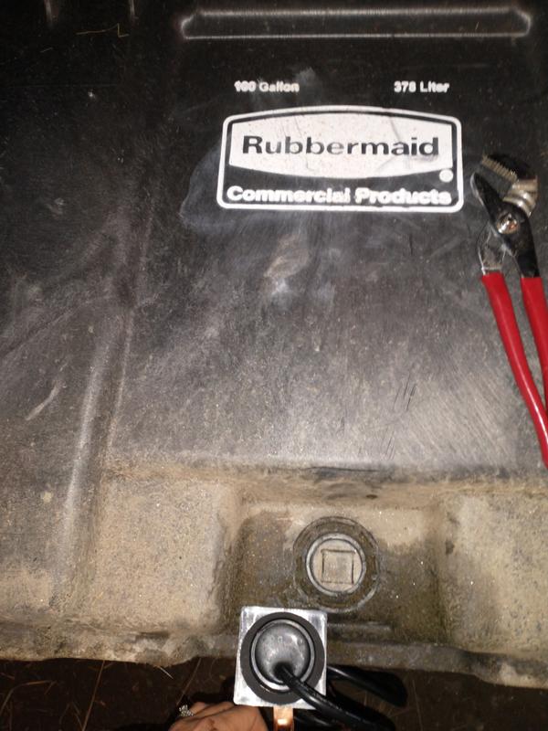 This non-fitting heater next to the drain hole on my tank. Note that it is clearly labeled Rubbermaid, and was purchased at tractor supply.