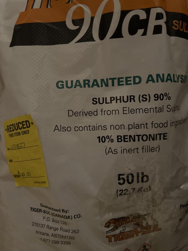 Taped up hole and “reduced this item only” sticker