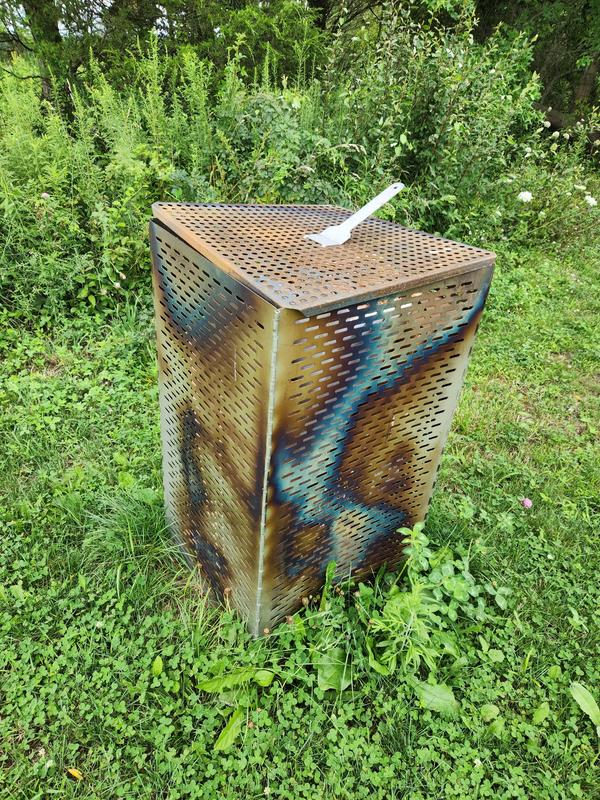 rusted stainless burn pit