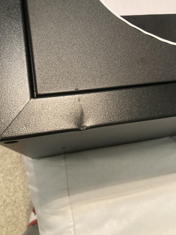 Small dent on bottom edge