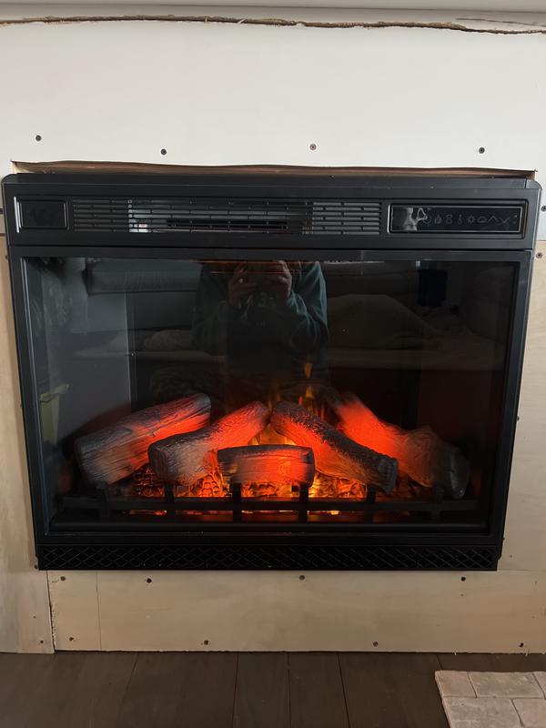 We still need to add the tile around the face of the fireplace.