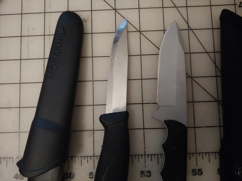 Gerber and Morakniv side by side (note scratches on Mora)