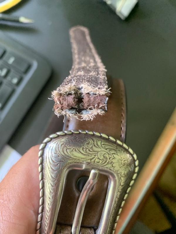 Inner side of belt "tongue' less than 30 days of use