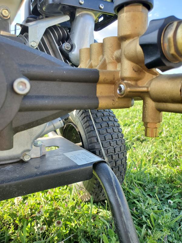 Leak spraying from bottom of brass pump manifold where it meets iron housing