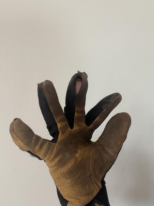 Split at seam; I wore these gloves to pick up branches and to rake leaves;