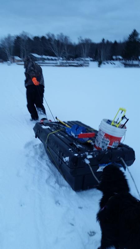 Using sled to haul ice shanty and gear