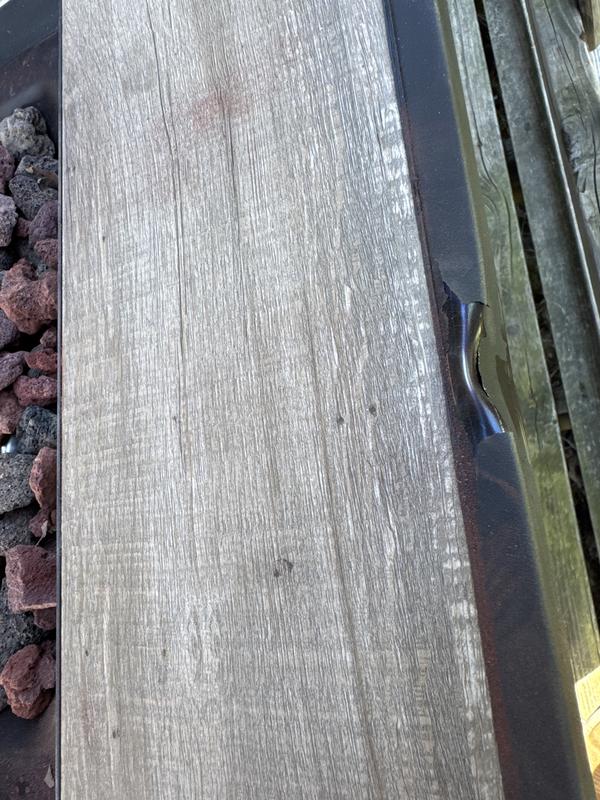 Paint flaking, dented