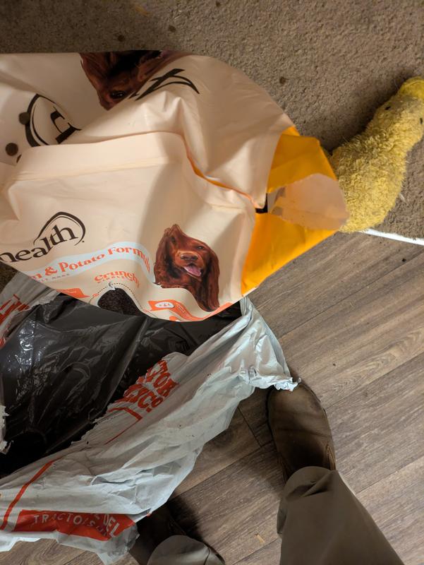 Splits in top corners of the bag, obtained during delivery