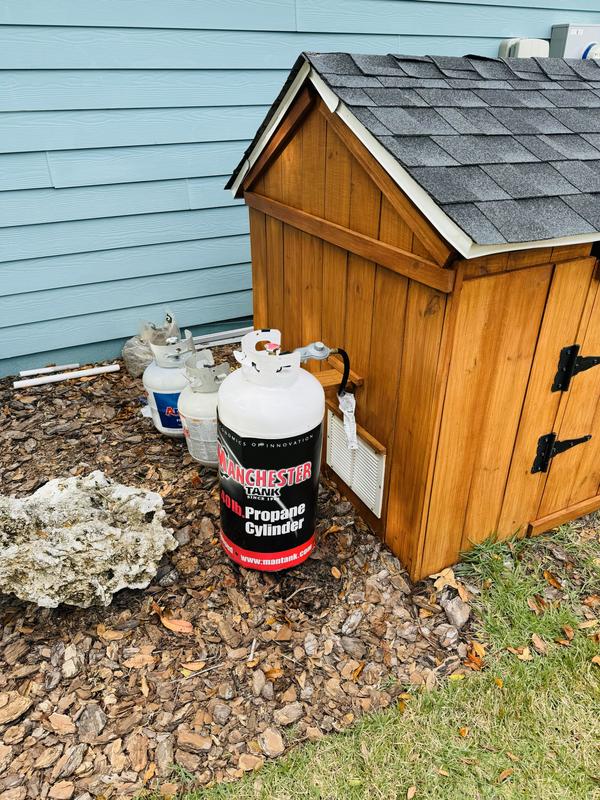 One of four 40-pound propane tanks to power backup generator.
