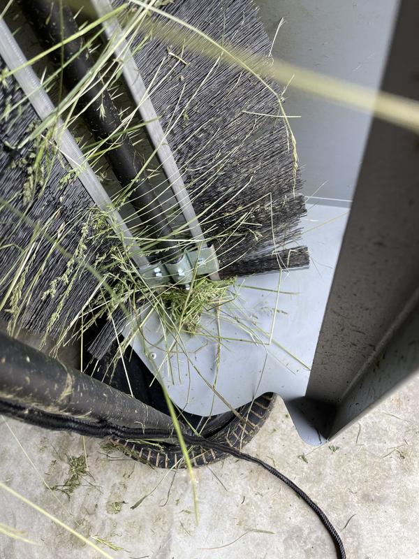 Grass binds the wheels and takes a bit to clear