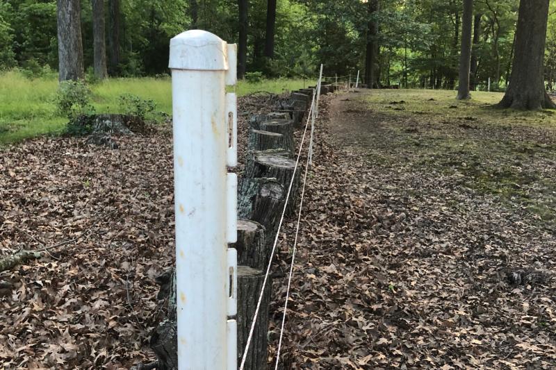 Sleeves on t-posts with step in posts in between