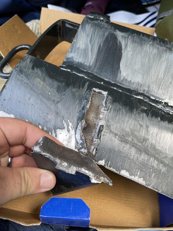 As you can see:  Improper material preparation and no weld penetration.  Completely unsuitable for a 40 ton application.