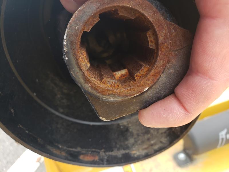 Button rusted in solid