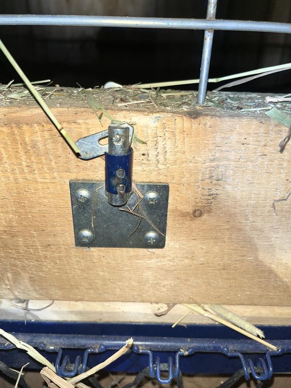 Metal locking pin had to be cut due to metal being too long. Also shows blue slot broken at weld