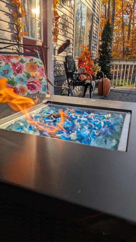 I did purchase blue glass for it and it's beautiful.