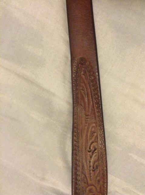 I applied cream to the top. That was the original color of the martingle. The bottom is cracking a pale from the other saddle soaps i used on it.