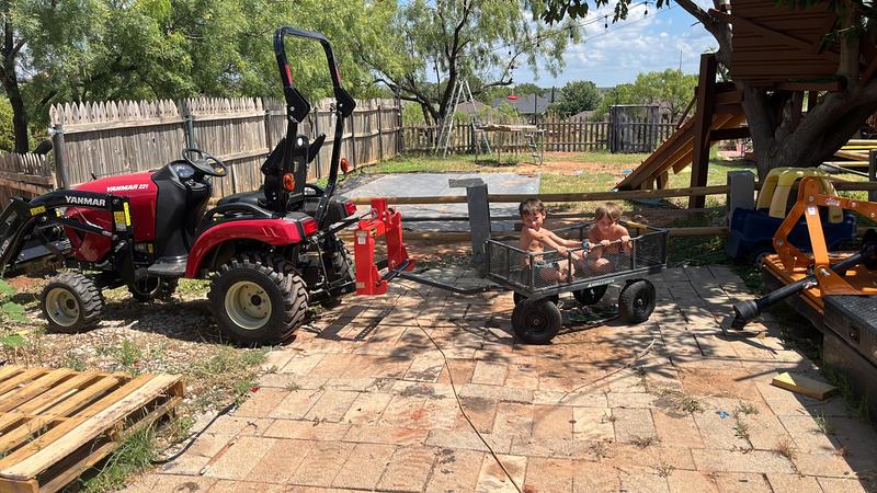 Towing kids around the yard