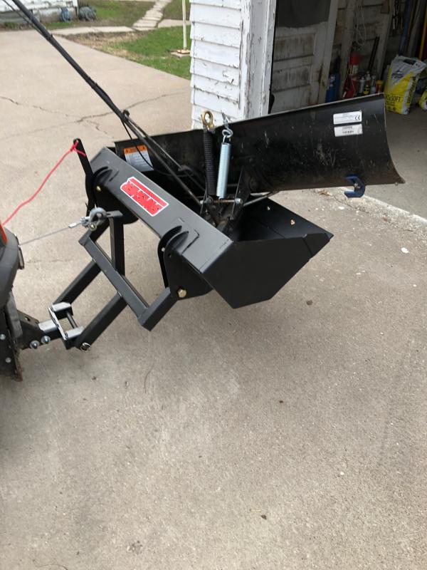 Hauling removed snow blade with newly installed Swisher Bucket!