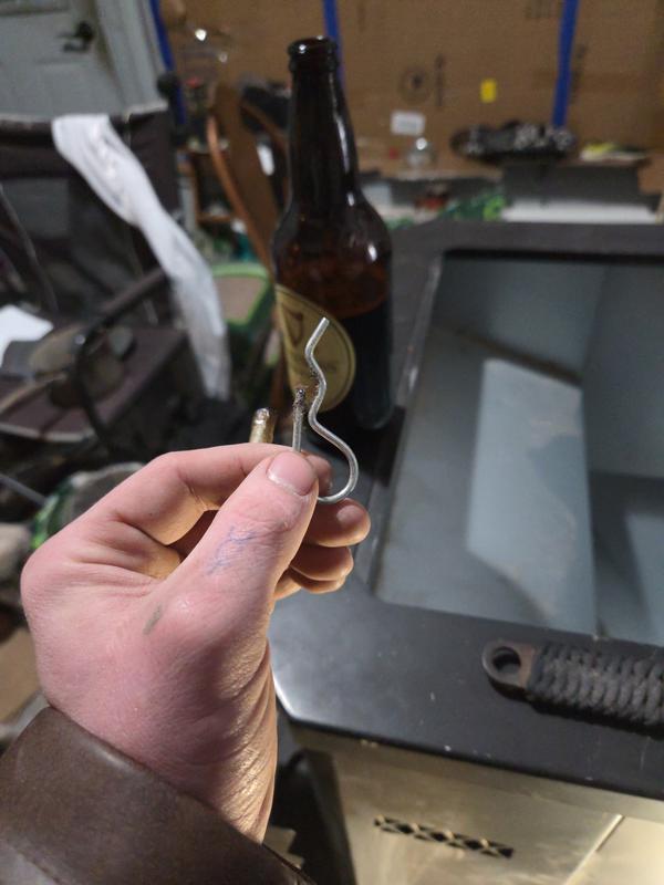 Broken pin that snapped and cause the motor too jam and break