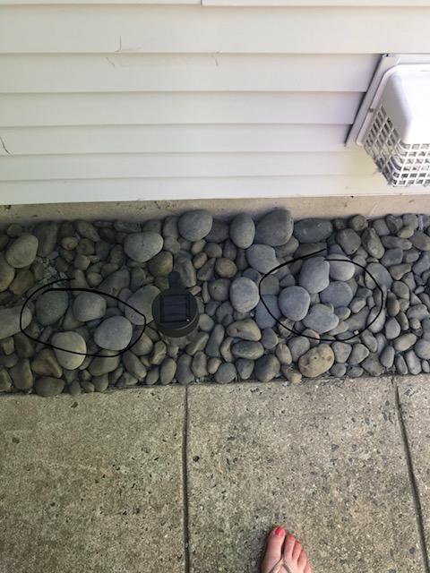 Large stone on top of medium