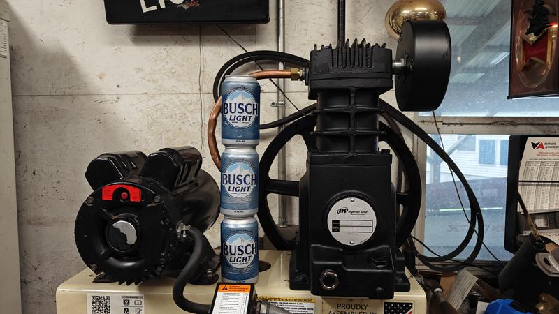 Pump installed with size reference.