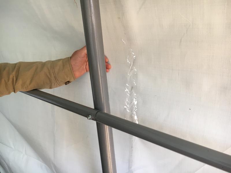 Less than one week installed, tarp tearing at each contact.