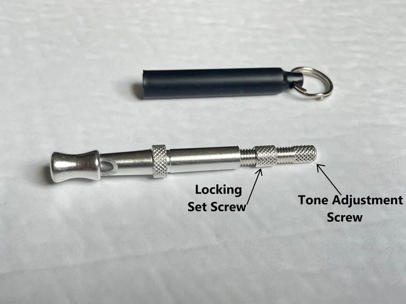 Whistle with cover removed, revealing tone adjustment mechanism