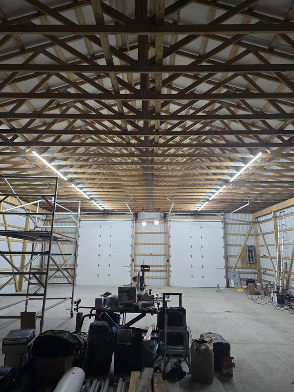 12ftx10ftx2in insulated doors. They are quit and work great when power goes out.