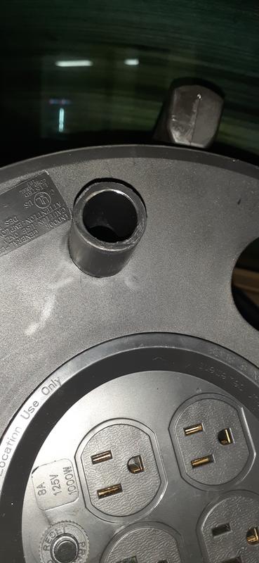 I would have thought there would have been some sort of Knob to crank this real with up top there where that post is sticking out. It did not come with anything nor did any of them in the store have it. Nor does it depict it in this photo online either.