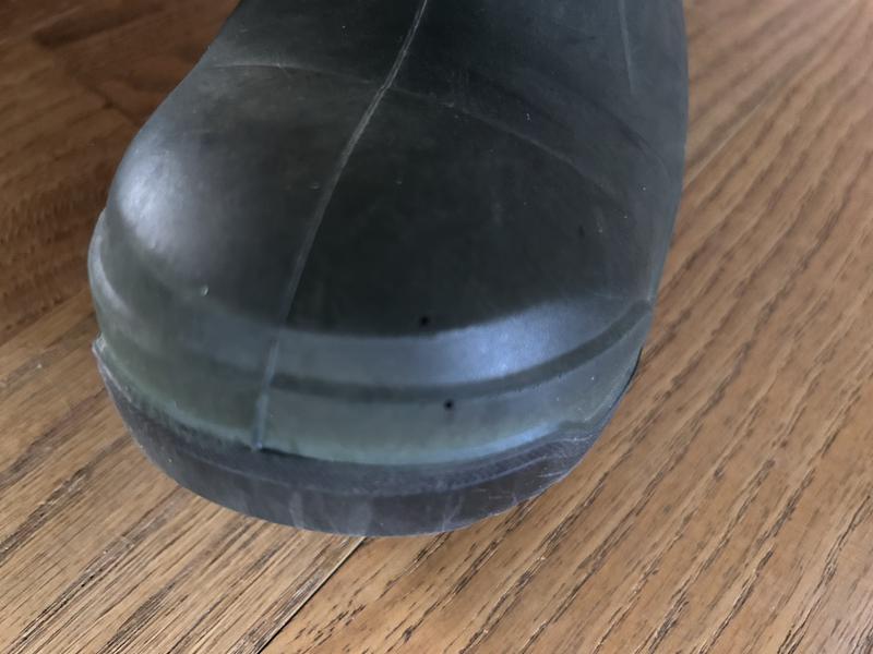 Regular height boots; hole didn't go all of the way through